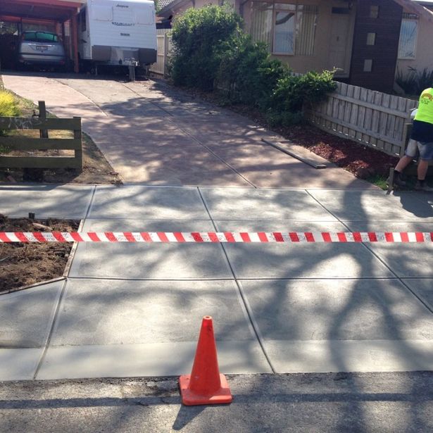 Concrete driveway prepared for concrete sealing